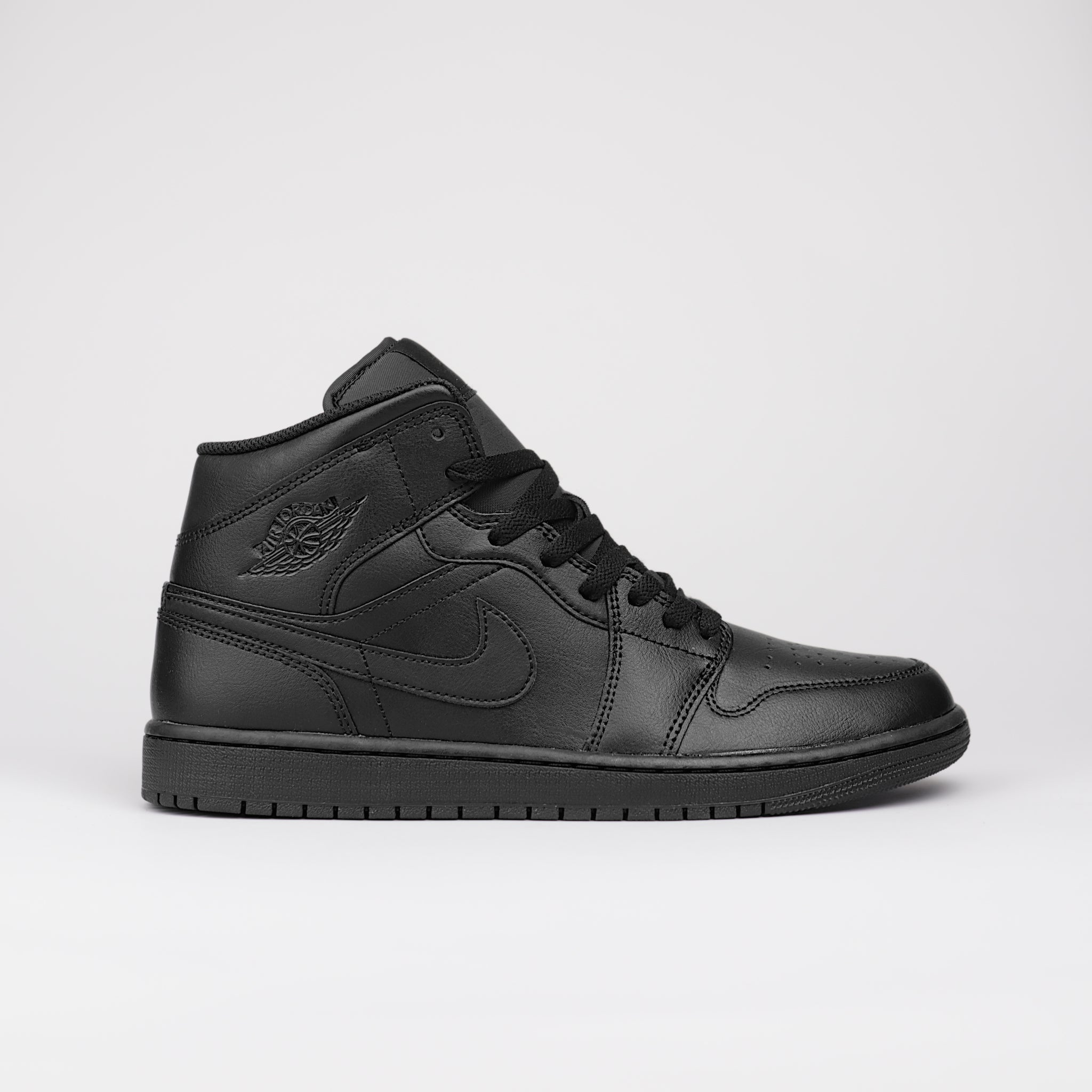 Jordan 1 Mid Triple Black