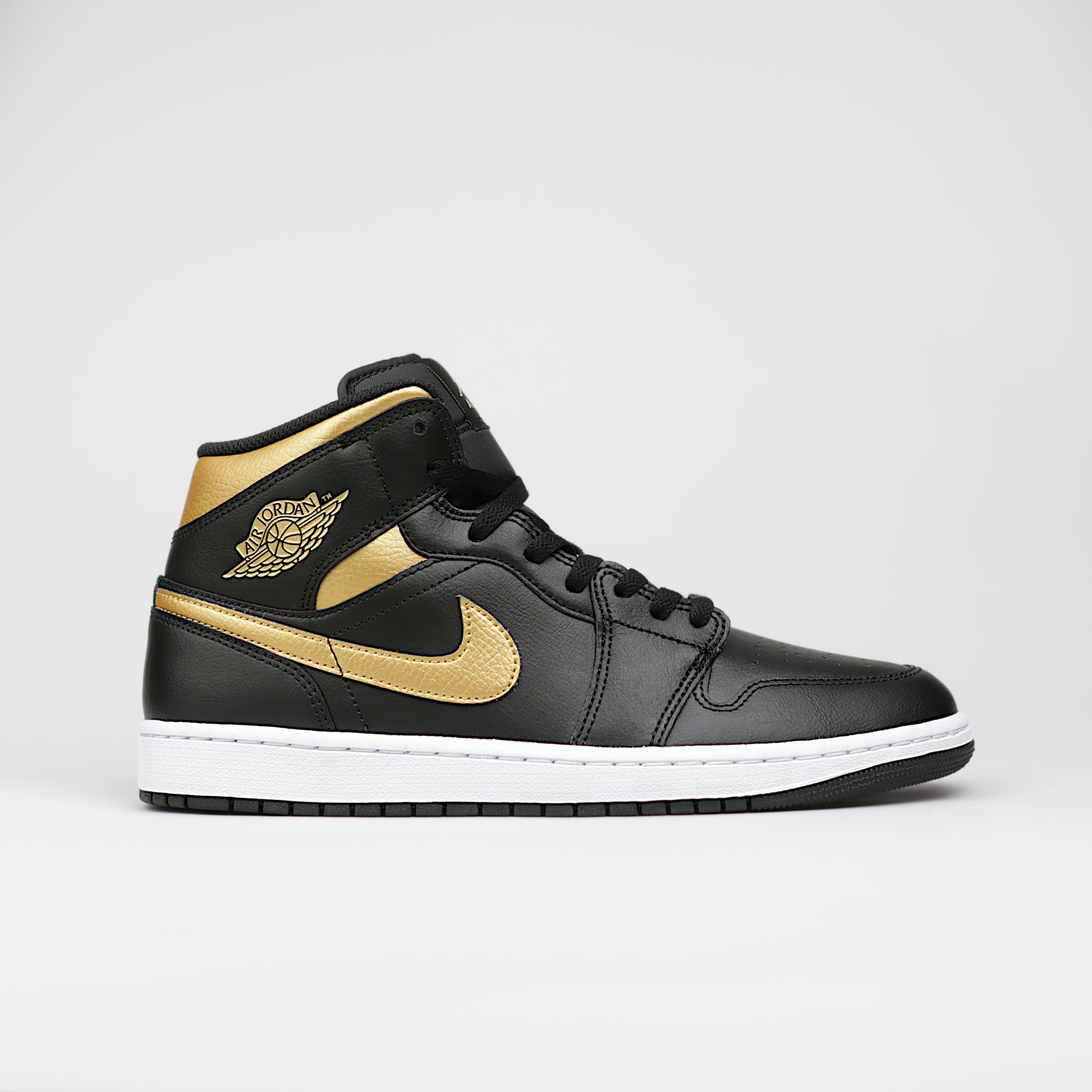 Jordan 1 Mid Black Metallic Gold