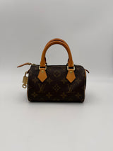 Louis Vuitton Nano Speedy Handväska I Monogram-Canvas