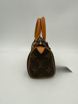 Louis Vuitton Nano Speedy Handväska I Monogram-Canvas