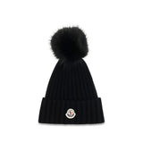 Moncler Svart Merinoullsmössa med Tofs