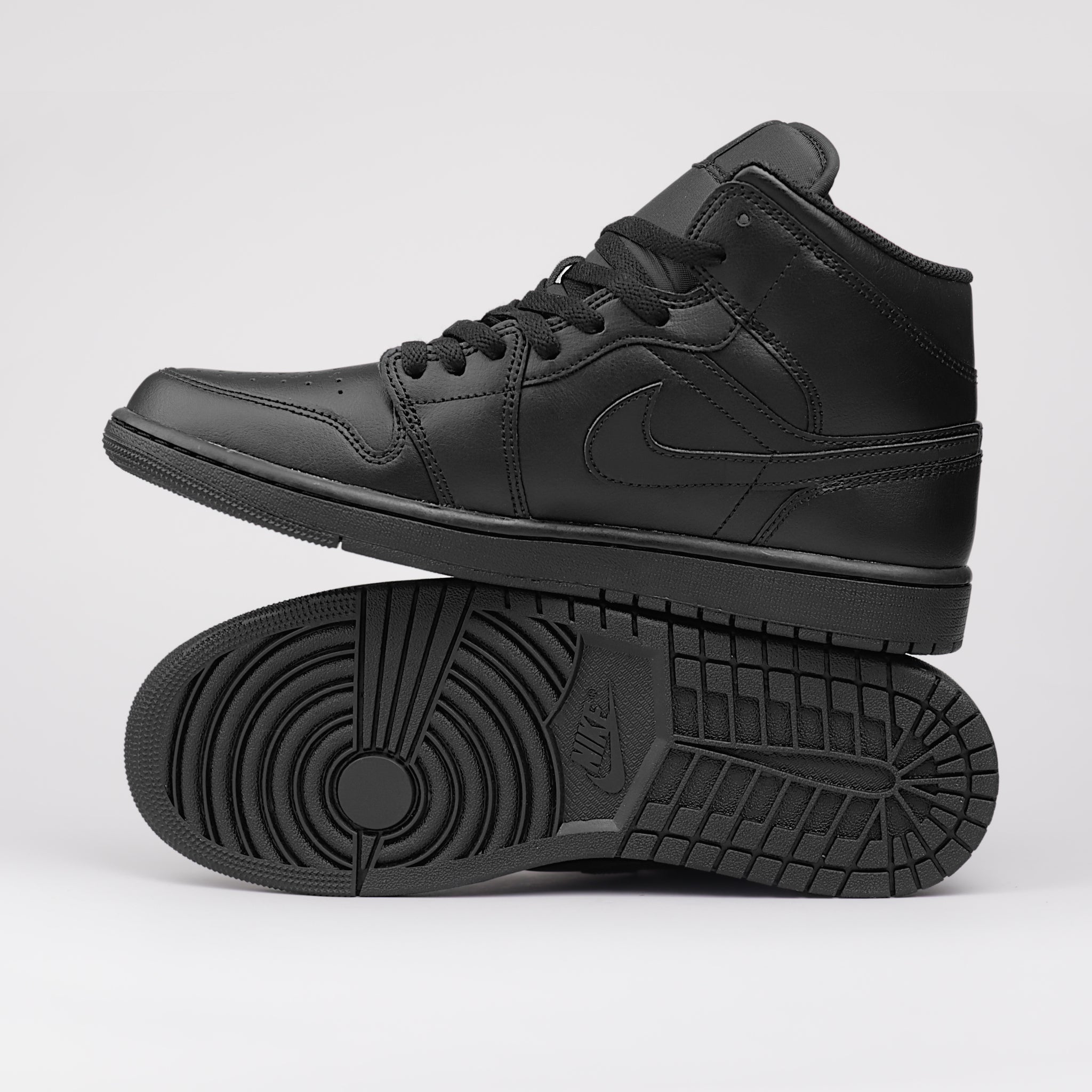 Jordan 1 Mid Triple Black